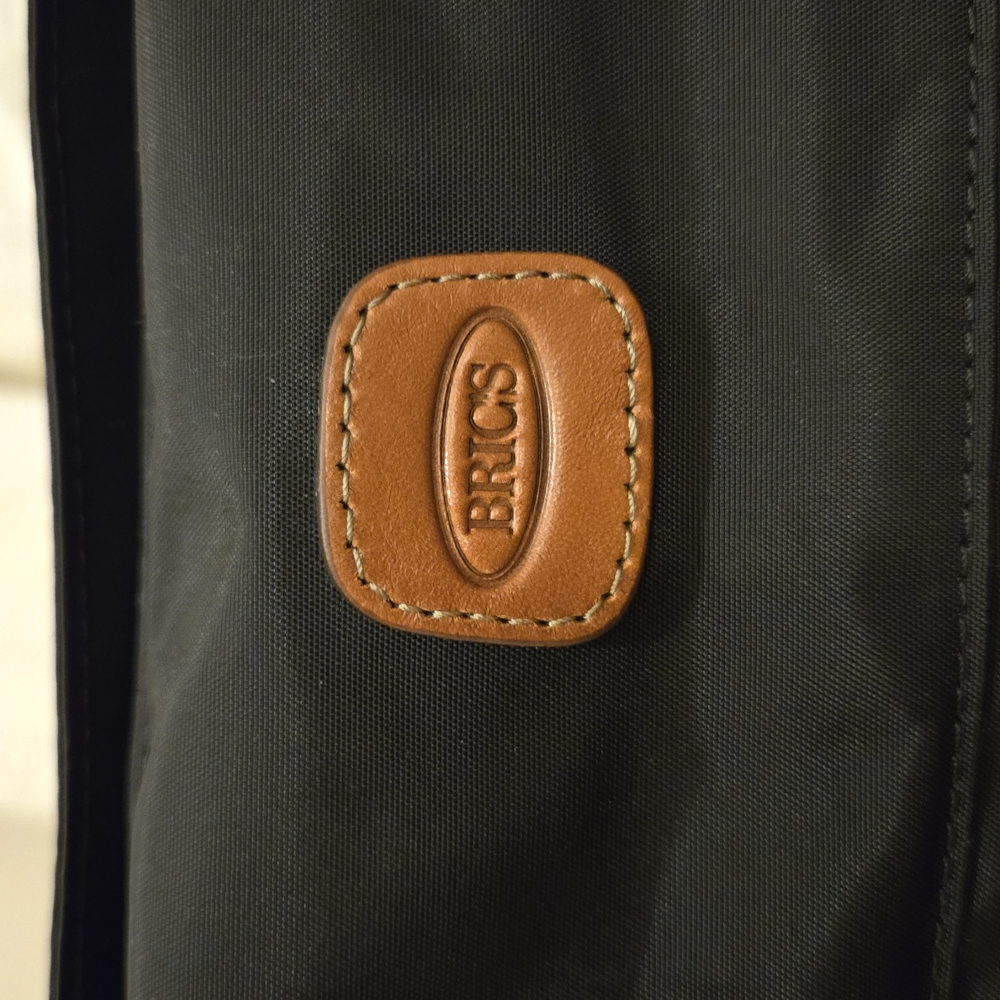 Bric's Black and Brown Laptop Bag with Sophisticated Leather Accents